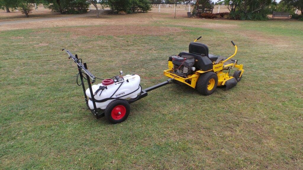 Riding lawn mower weed sprayer